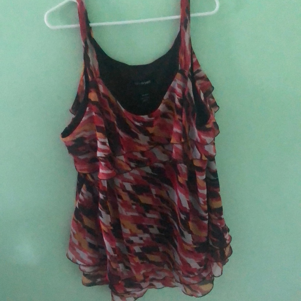 Red patterned light weight blouse.